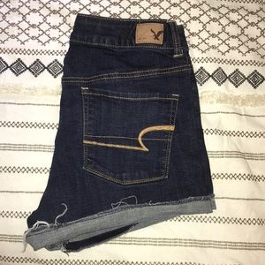 High rise dark wash AE shorts
